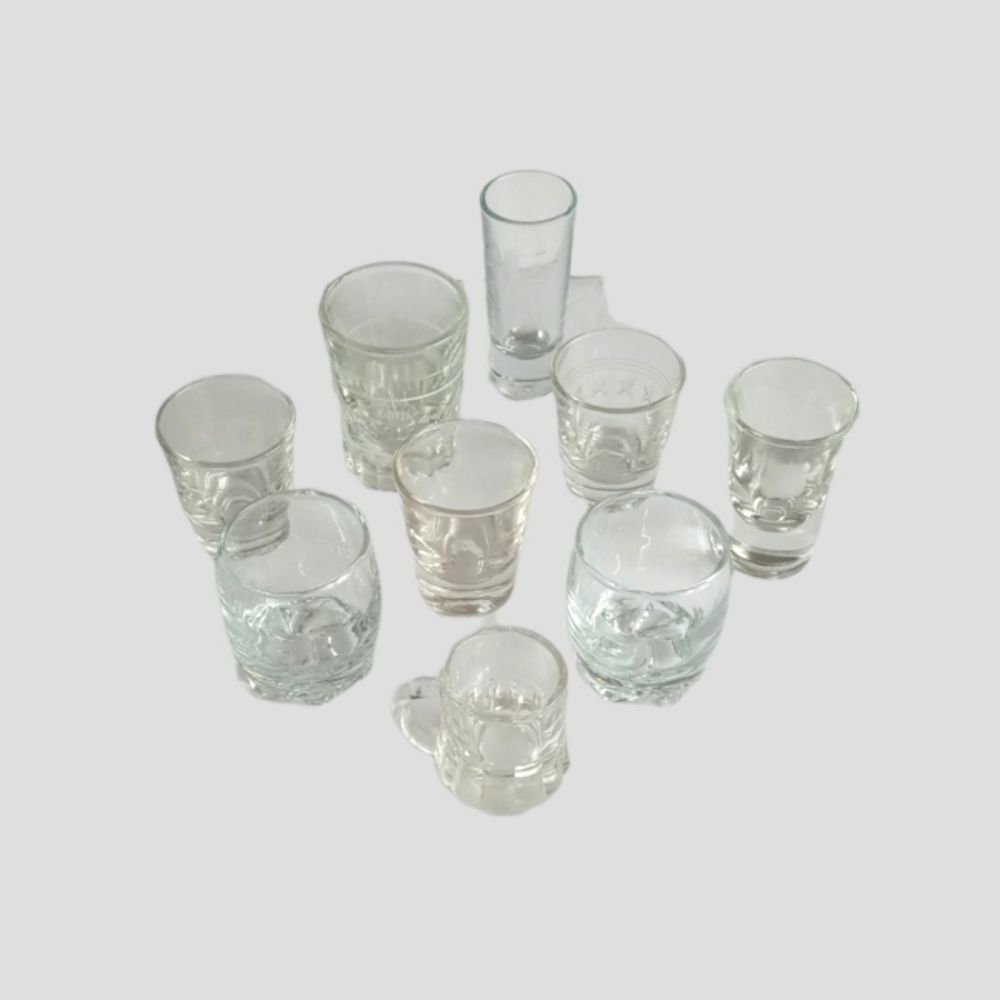 9 Piece Collection of Vintage Shot Glasses